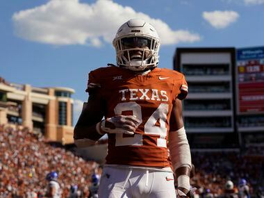 Texas running back Jonathon Brooks (24) celebrates as he scores on a touchdown run against...