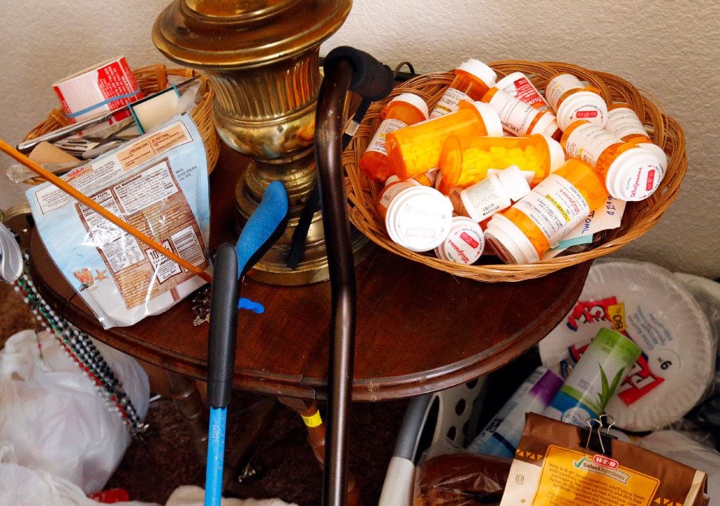 Pills and snacks are on hand in Andrie's "man cave" on Sunday, April 9, 2017, when he hung out watching the Masters Golf Tournament on TV. (Tom Fox/The Dallas Morning News)