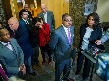 Family members of Kendra Hatcher stand behind prosecuting attorney Kevin Brooks and Dallas...