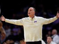 TCU head coach Jamie Dixon reacts to a call during the first half of an NCAA college...