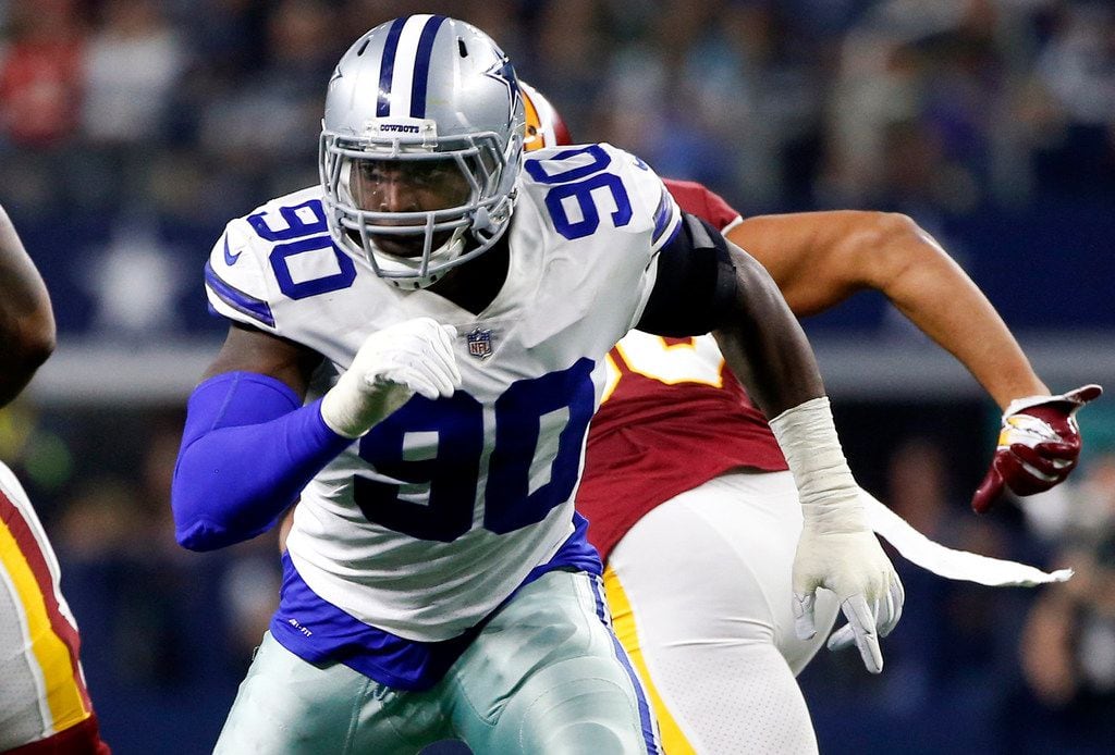 FILE - In this Nov. 22, 2018, file photo, Dallas Cowboys defensive end Demarcus Lawrence...