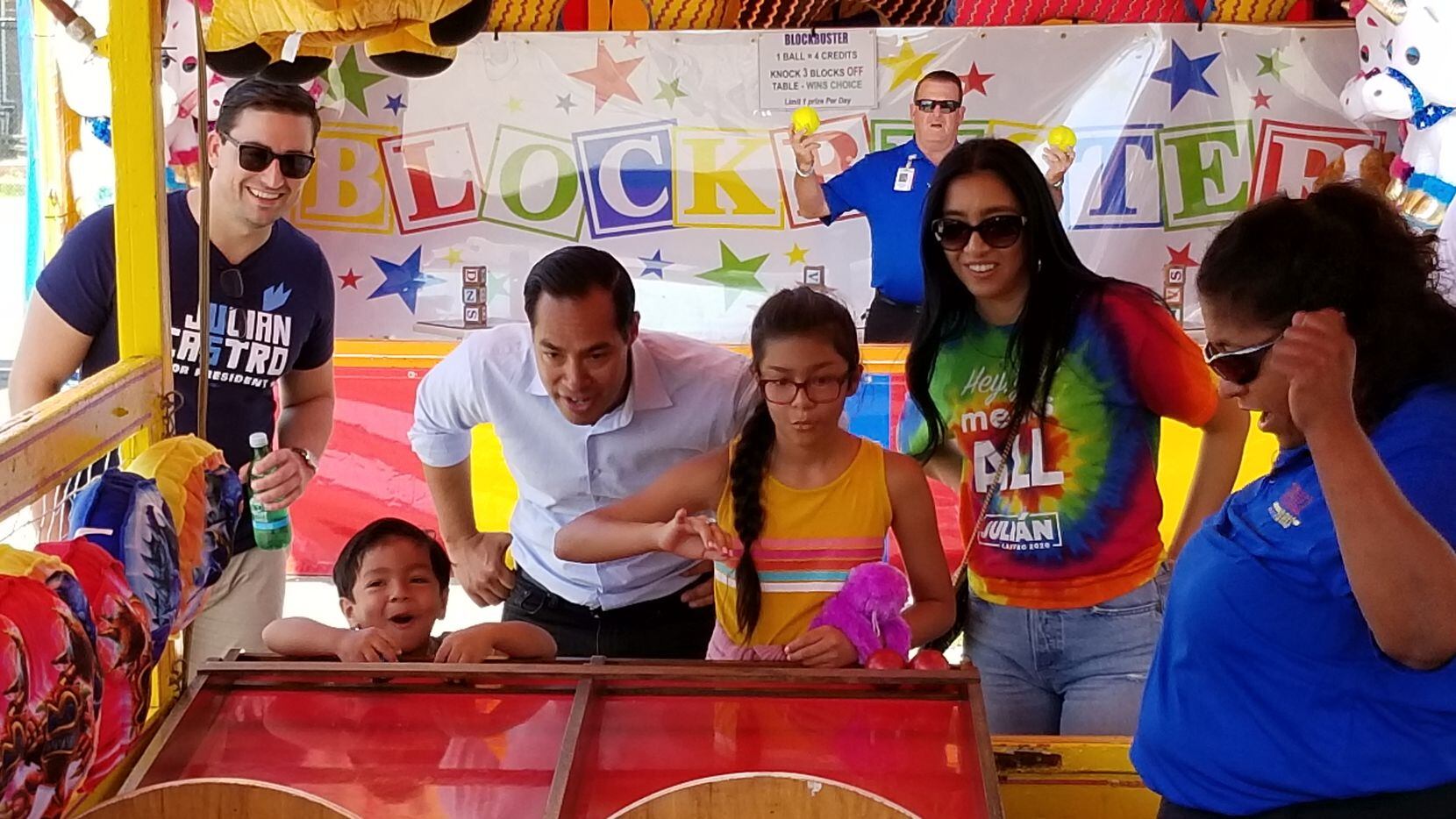 Cristián Castro, 4, and his sister Carina, 10, play Rainbow Roll at the Iowa State Fair on...