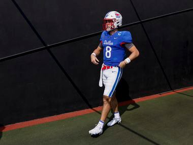 SMU quarterback Tanner Mordecai (8) walks to the field before a game against TCU at Ford...
