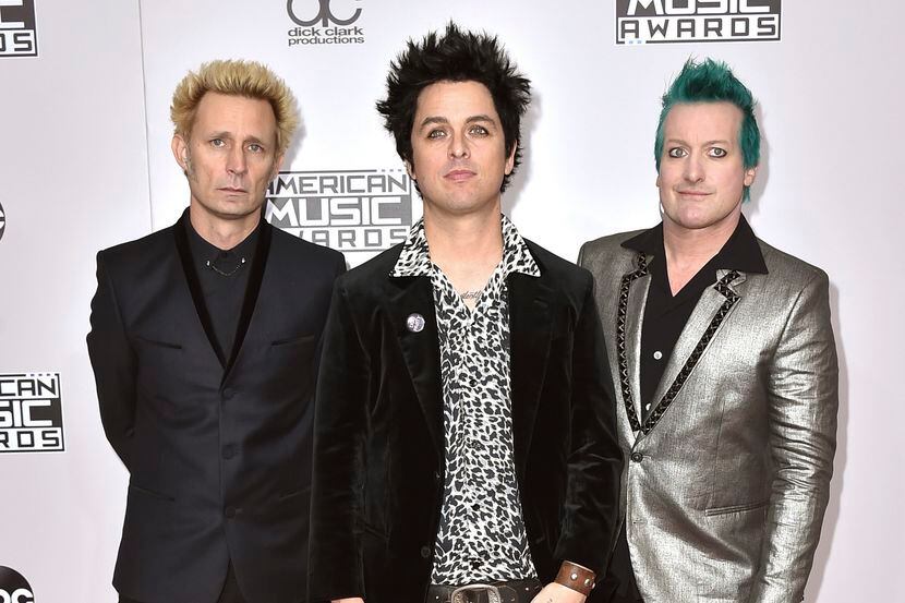 Mike Dirnt, Billie Joe Armstrong, y Tre Cool, integrantes de la banda Green Day, AP
