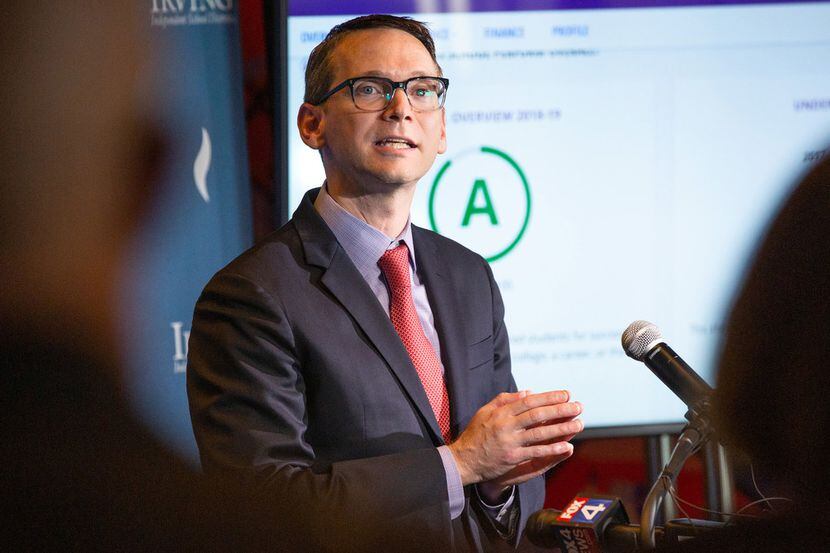 Texas education Commissioner Mike Morath speaks to the media and educational leaders...