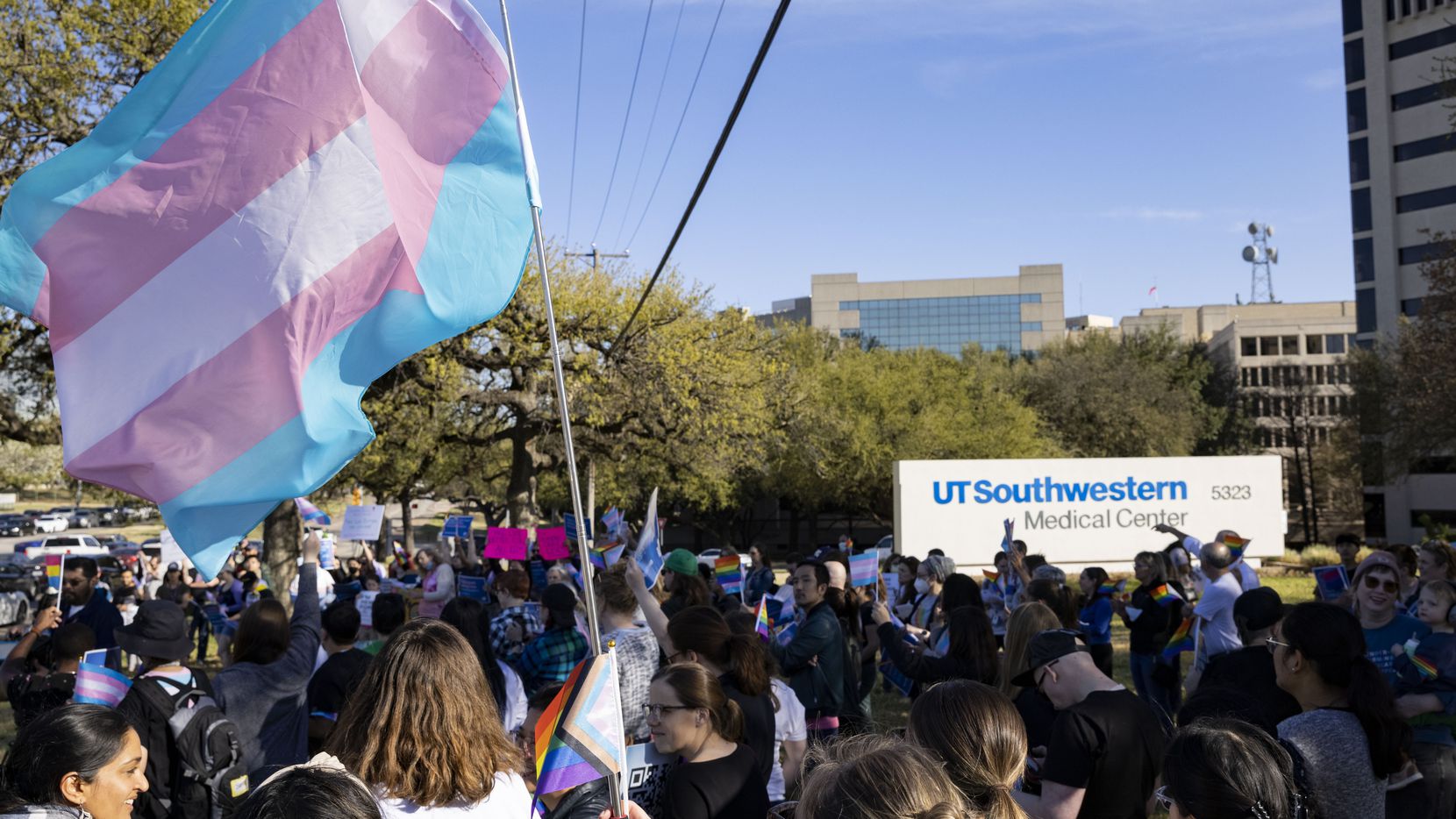 Protestors gather at the University of Texas Southwestern Medical Center following the...