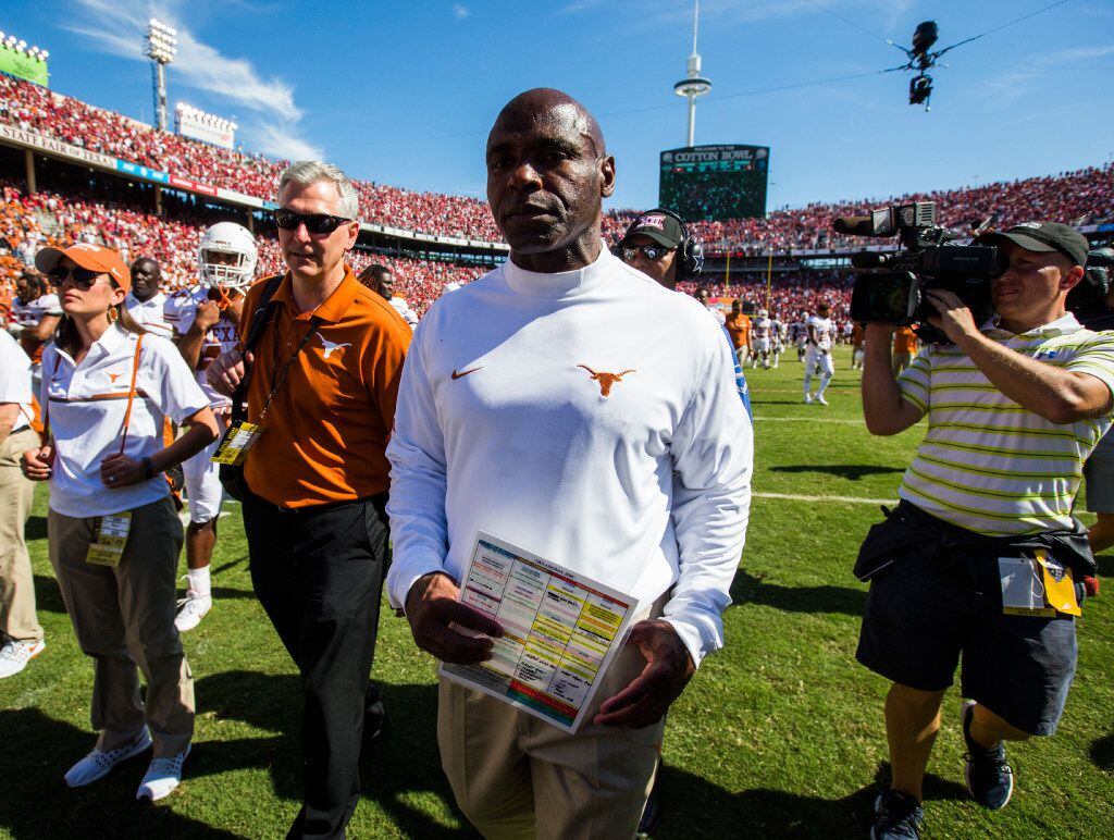 Texas Longhorns head coach Charlie Strong walks off the field after losing the 2016 AT&T Red...