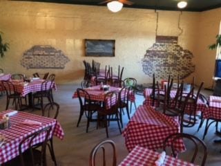 Customers dining inside S&D Oyster Company in Dallas will be able to see two patched holes...