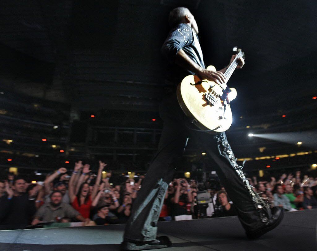 U2's Adam Clayton performs at Cowboys Stadium in Arlington on Monday, October 12, 2009.