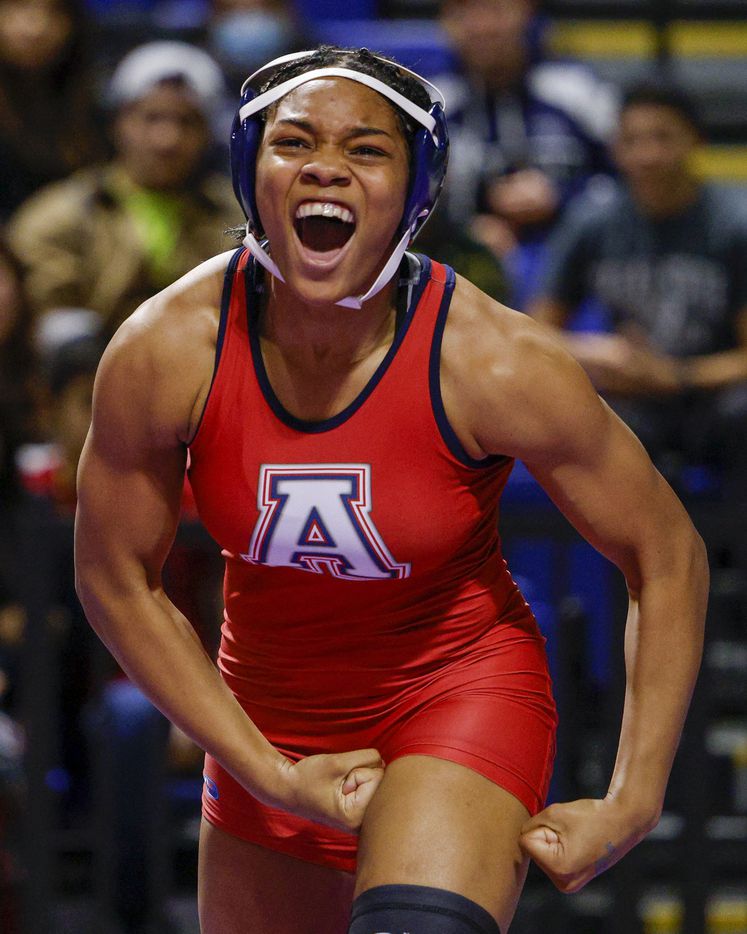 Jasmine Robinson of Allen celebrates after winning the championship match of the 6A girls...