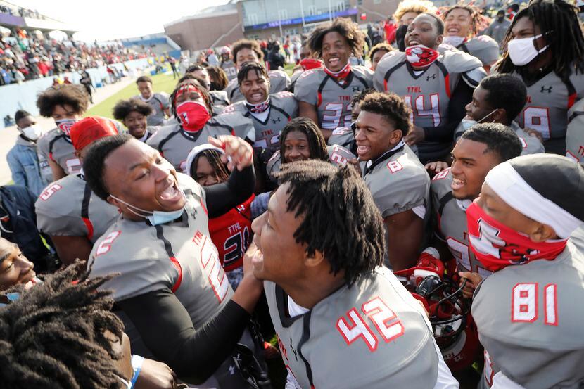 Cedar Hill High School free safety Kendall Stevens (2) leads his team in a victory cheer...