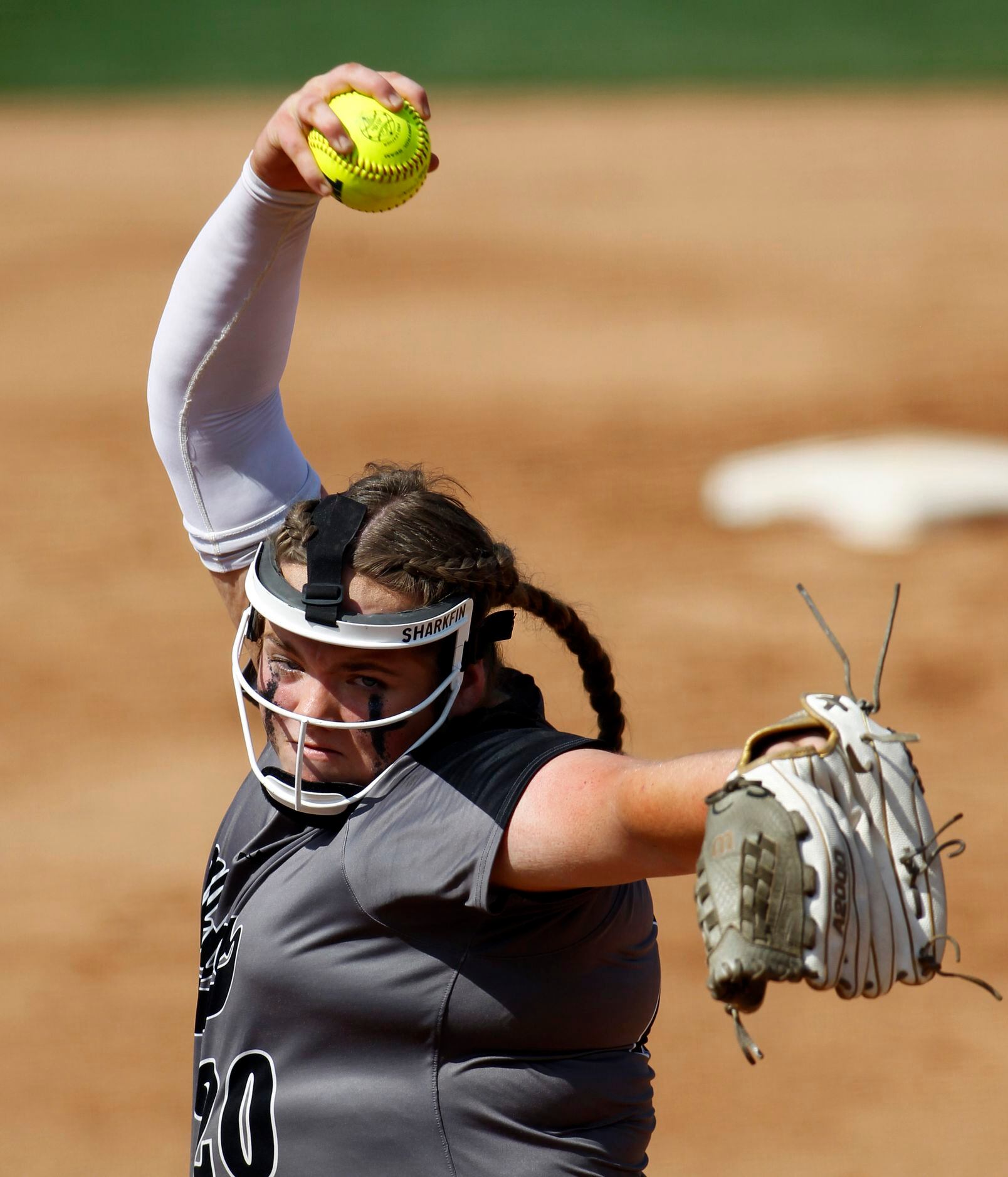 Denton Guyer pitcher Finley Montgomery (20) delivers a pitch to a Pearland batter during the...