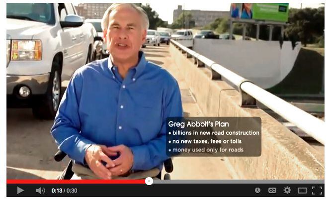 
In his latest ad, Greg Abbott appears on a bridge skirting a highway and says: “A guy in a...
