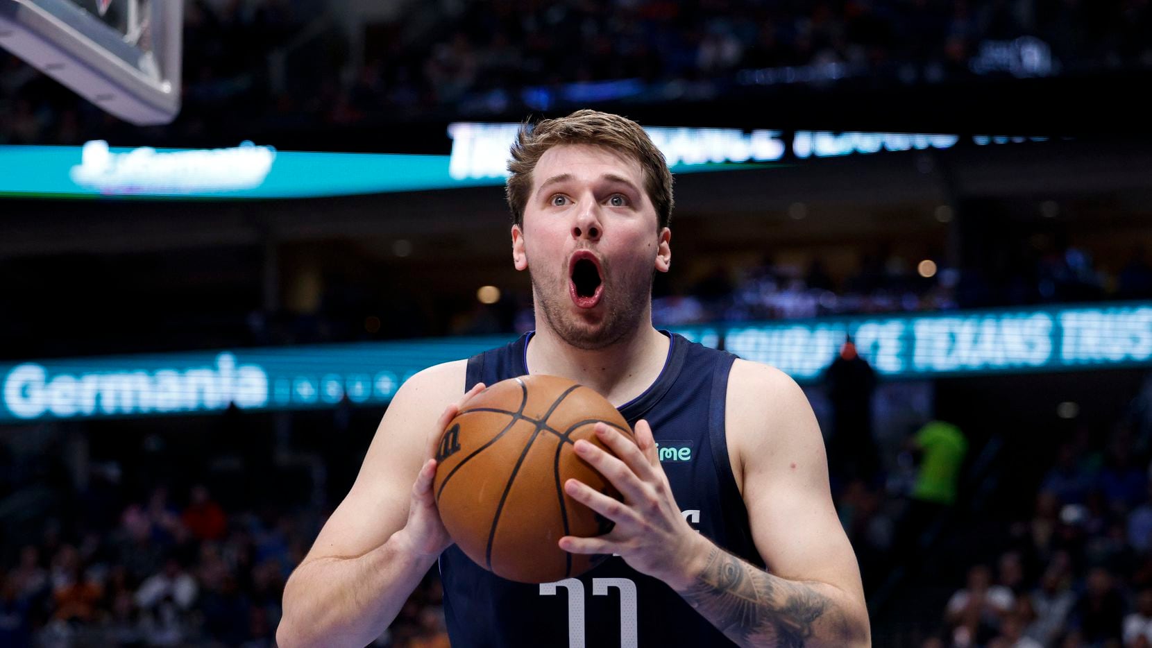 Dallas Mavericks guard Luka Doncic (77) reacts after a called foul during the second quarter...