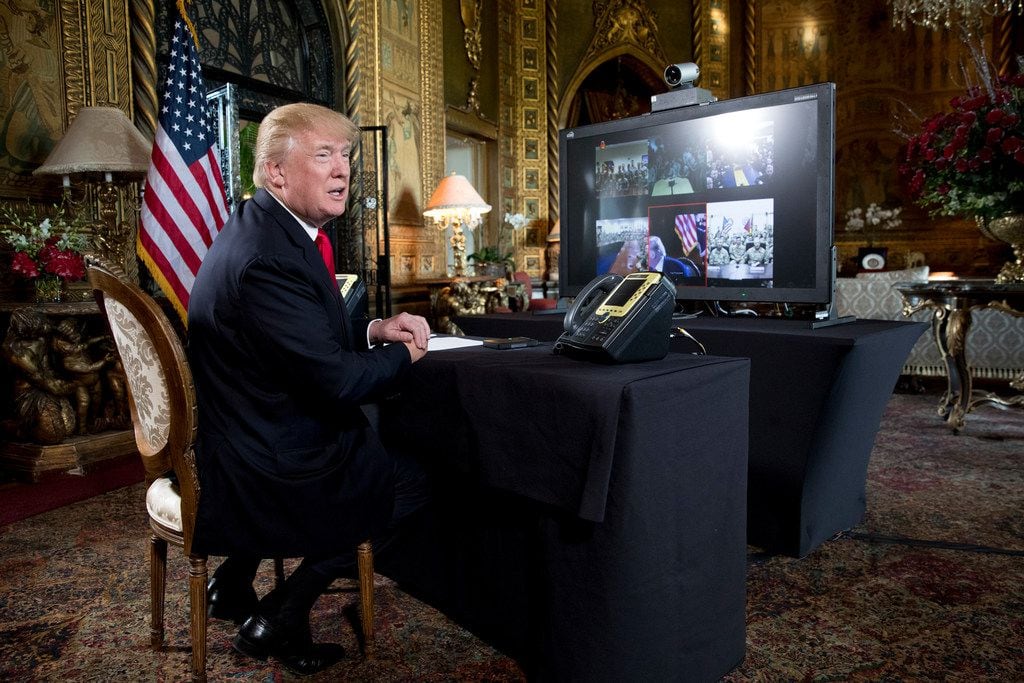 President Donald Trump made a video call to military personnel from his Mar-a-Lago estate in...