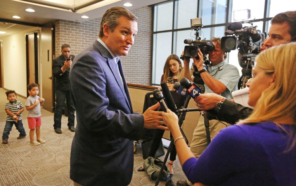 United States Senator Ted Cruz talks with the media as he makes a stop at the Republican...