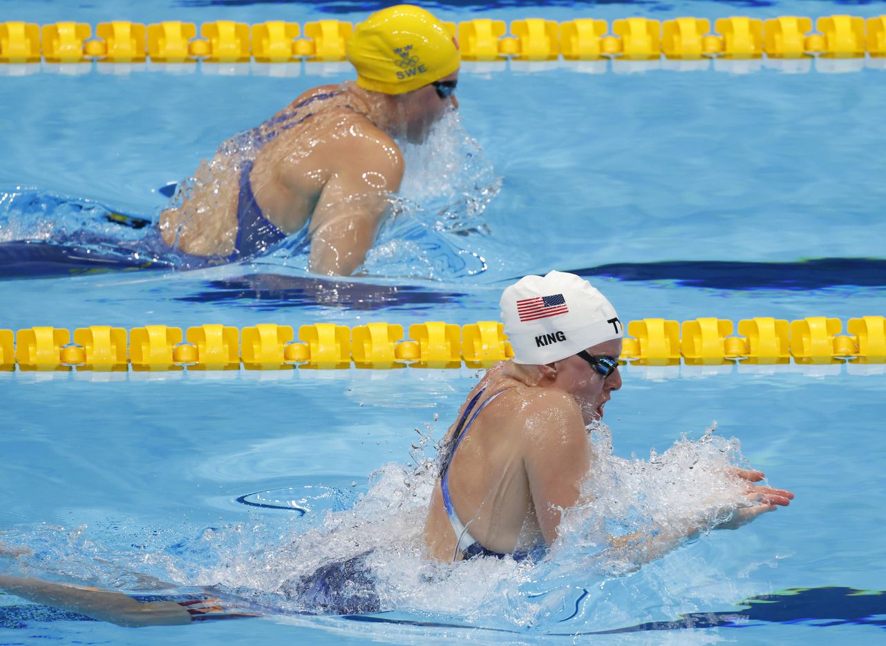 USA’s Lilly King competes in the women’s 50 meter breaststroke at a swim qualifying event...
