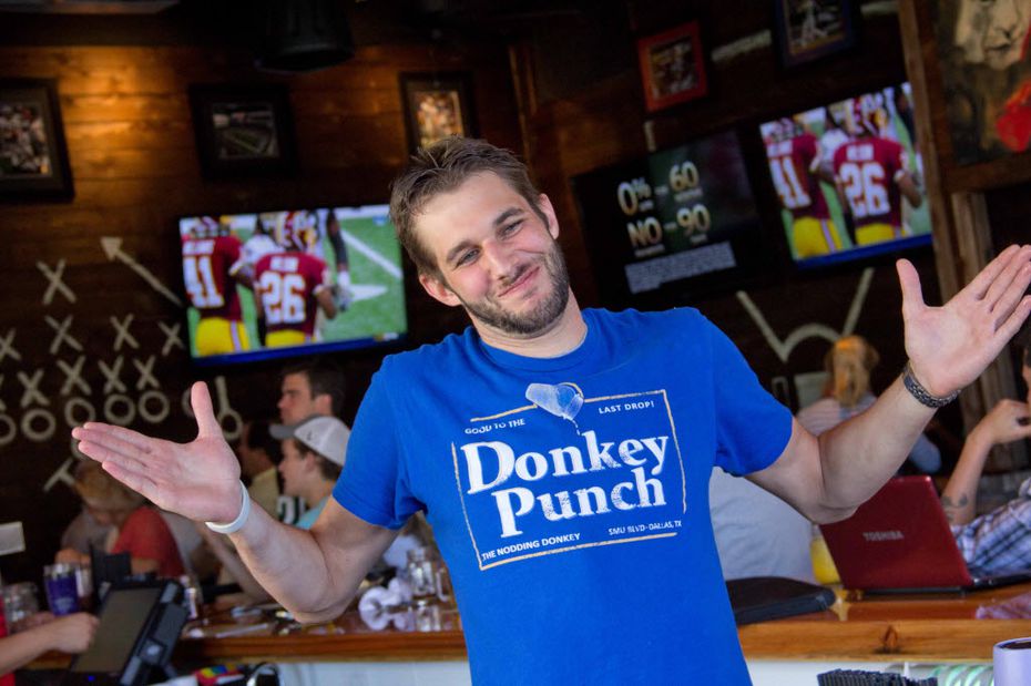 Sage Bueltel, photographed in 2012, wears a shirt touting the Nodding Donkey's famous — and...