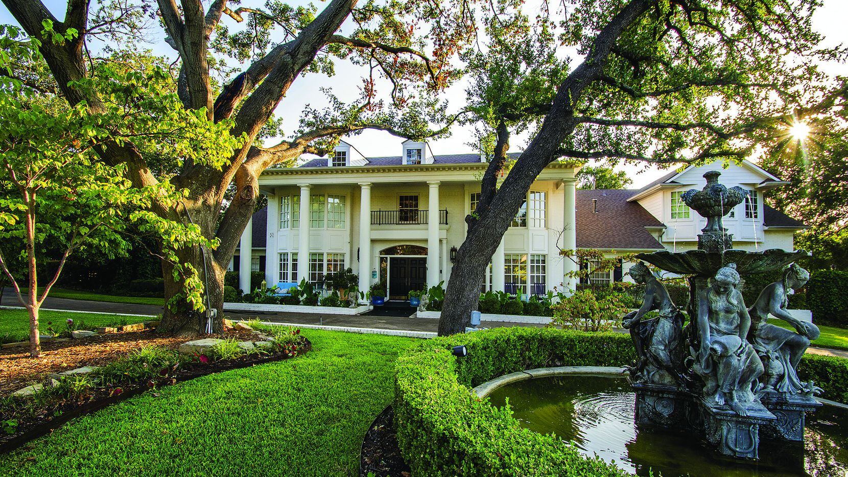 The Greek Revival home at 6706 Gateridge Drive in Northwood Hills is offered for $1,450,000 by The Shamsa Group.