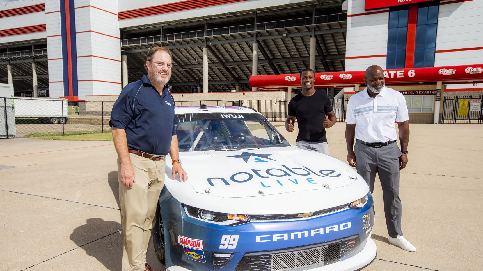 Texas Motor Speedway president Eddie Gossage, former Cowboy Emmitt Smith and Jesse Iwuji unveil Notable.Live paint scheme on No. 99 B.J. McLeod Motorsports Chevrolet for Oct. 24 NASCAR Xfinity Series O Reilly Auto Parts 300 at Texas Motor Speedway.Texas Motor Speedway President Eddie Gossage, left, NASCAR Driver Jesse Iwuji, center, and former Dallas Cowboys running back and NASCAR team sponsor Emmitt Smith, right, unveil Iwuji   s No 99 Notable Live Chevrolet car at Texas Motor Speedway on Thursday, October 22, 2020 in Fort Worth, Texas. (Brandon Wade/Getty Images for Texas Motor Speedway) ORG XMIT: 775580512