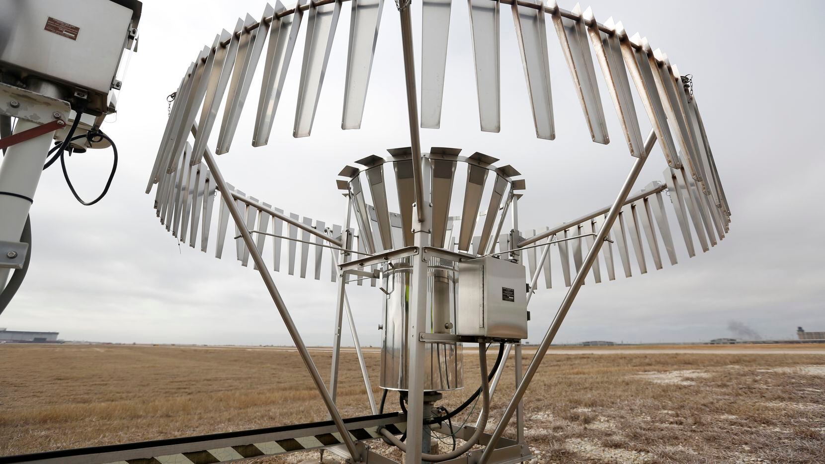 The National Weather Service's rain gauge at the climate site at Dallas/Fort Worth International Airport in Irving, Texas on Tuesday, Feb. 26, 2019. (Rose Baca/Staff Photographer)