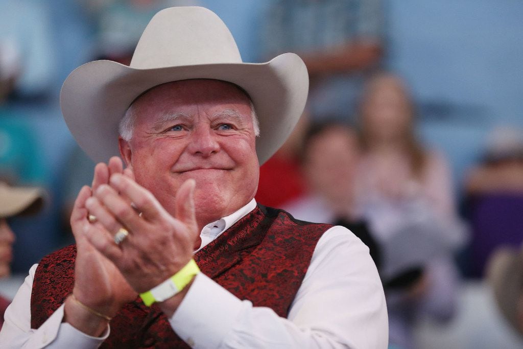 Texas agriculture commissioner Sid Miller applauds during the State Fair of Texas Youth...