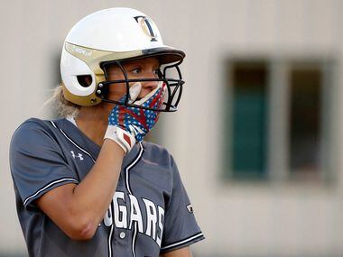The Colony's Jayda Coleman (10) to a teammate being called out on strikes by Birdville...