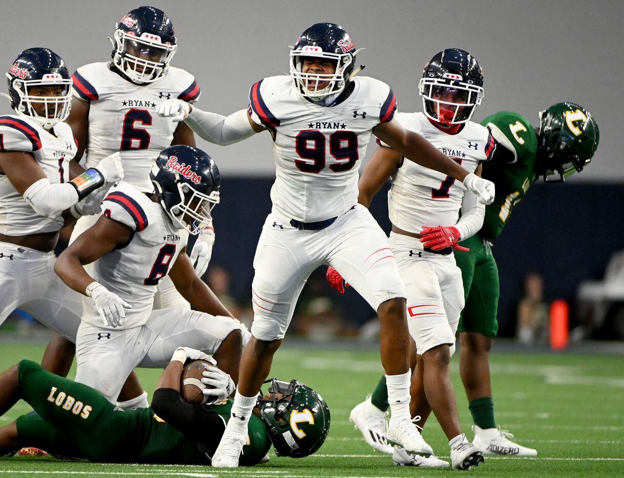 Denton Ryan’s Ravonte Blowe (99) celebrates after stopping Longview’s Taylor Tatum (28) on a fourth down run in the third quarter during a high school football game between Longview and Denton Ryan, Saturday, Aug. 28, 2021, in Frisco, Texas. Denton Ryan won 40-7. (Matt Strasen/Special Contributor)