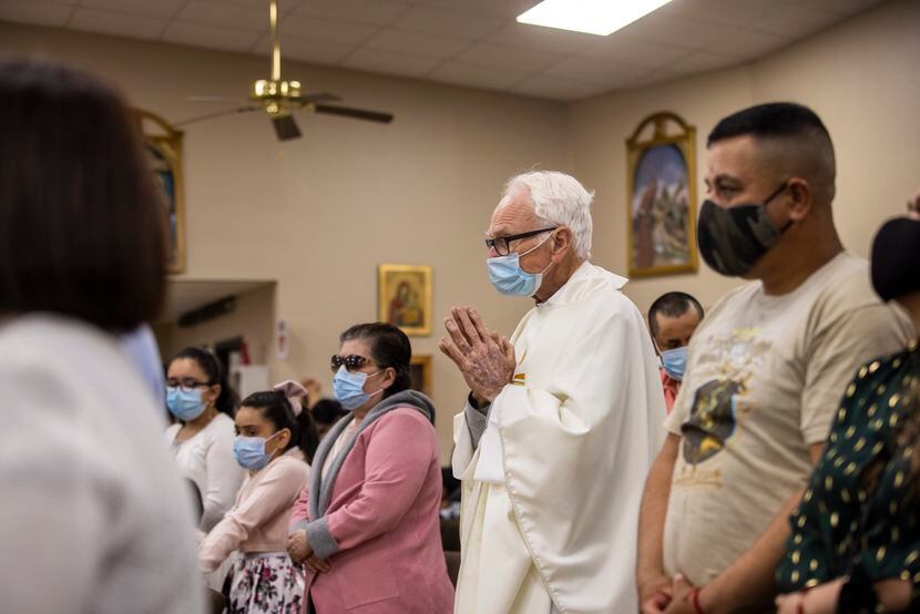 Father Tim Gollob at the sanctuary of Corpus Christi Catholic Parish, where he delivered a...