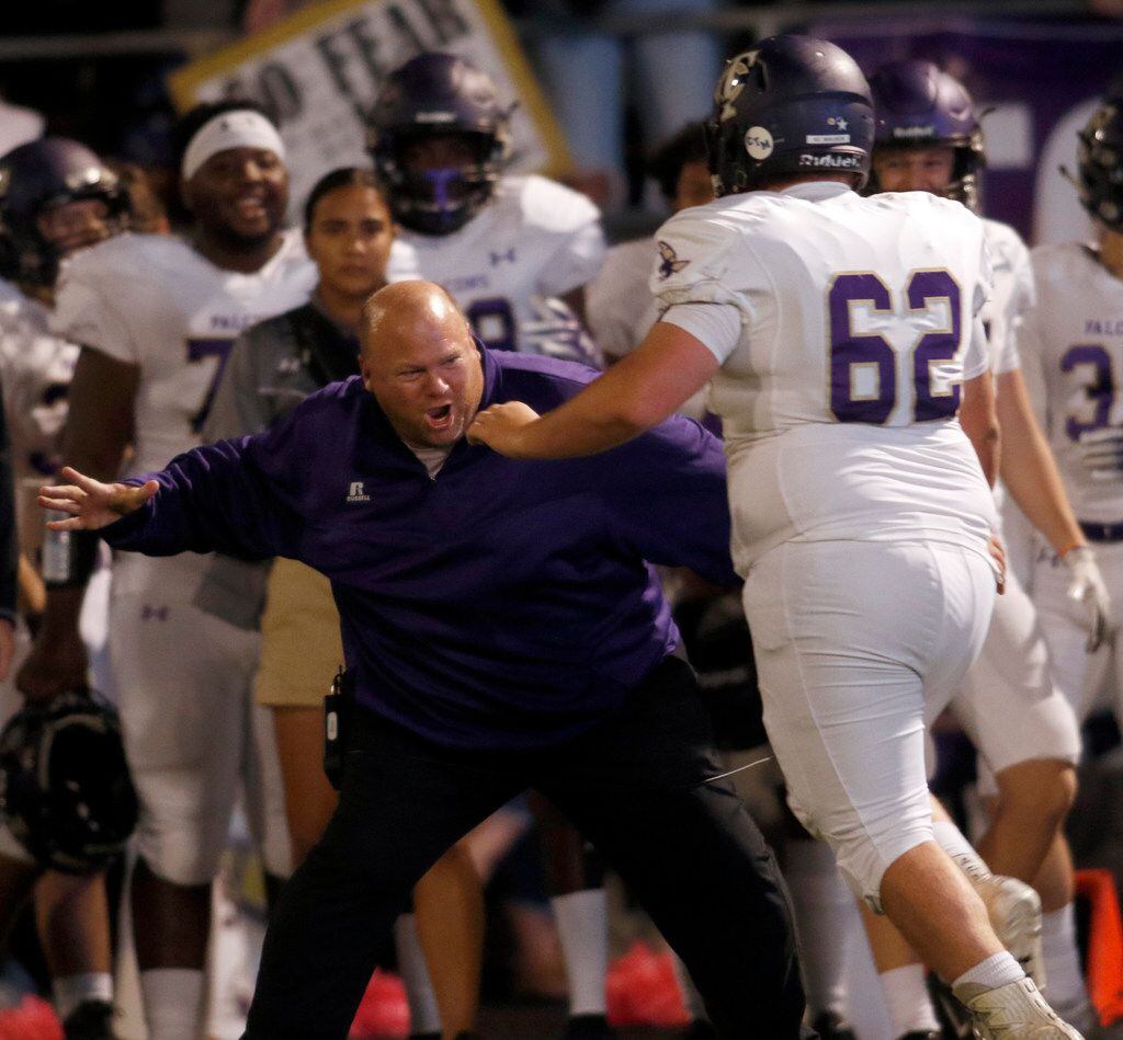 Keller Timber Creek offensive line coach Rickey Badley enthusiastically welcomes offensive...