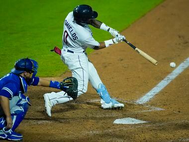 Round Rock Express outfielder Delino DeShields drives in two runs with a double during the...