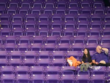 TCU fans watch the fourth quarter of a loss to Georgia during a College Football Playoff...
