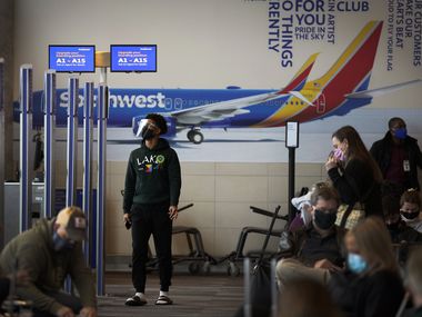 Passengers waited at Southwest Airlines gates inside the terminal at Dallas Love Field earlier this month.