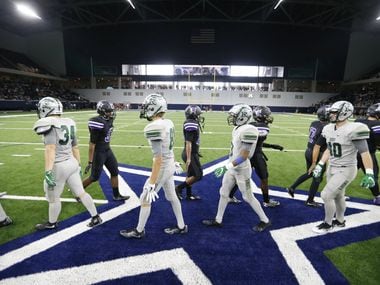 Independence High School and Reedy High School meet at the 50 yard line after playing in the...