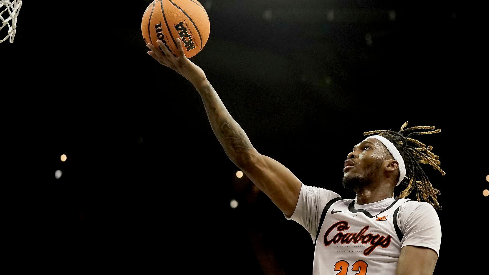 Oklahoma State forward Tyreek Smith puts up a shot during the second half of an NCAA college...