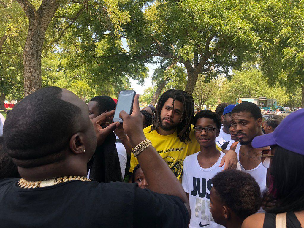 Rapper J.Cole surprises a small crowd at a back to school festival in Oak Cliff on Saturday,...