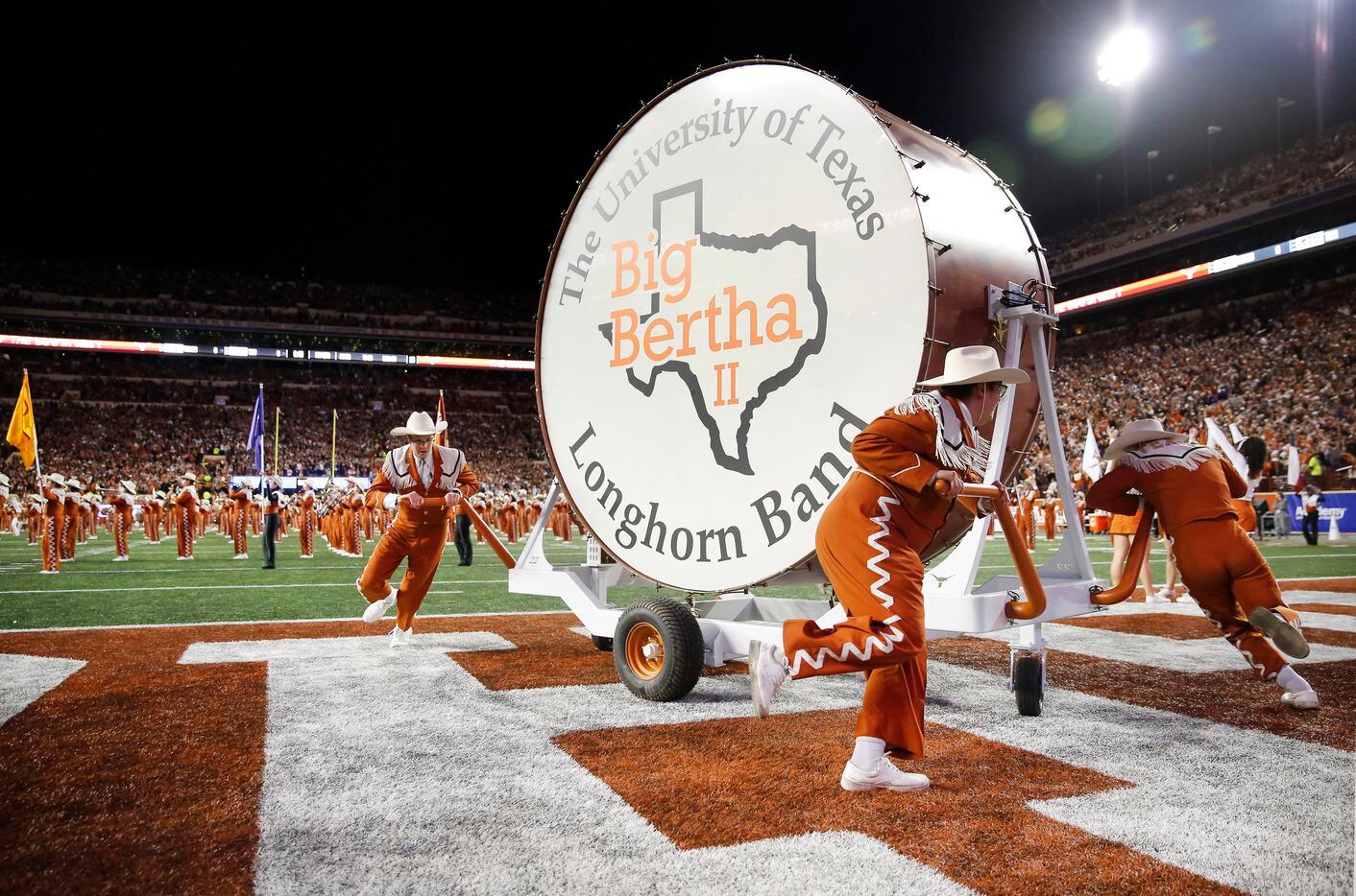 The Texas Longhorn Band spins the bass drum before the TCU Horned Frogs game at DKR Texas...