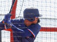 Texas Rangers minor league outfielder Anthony Gutierrez takes part in a batting practice...