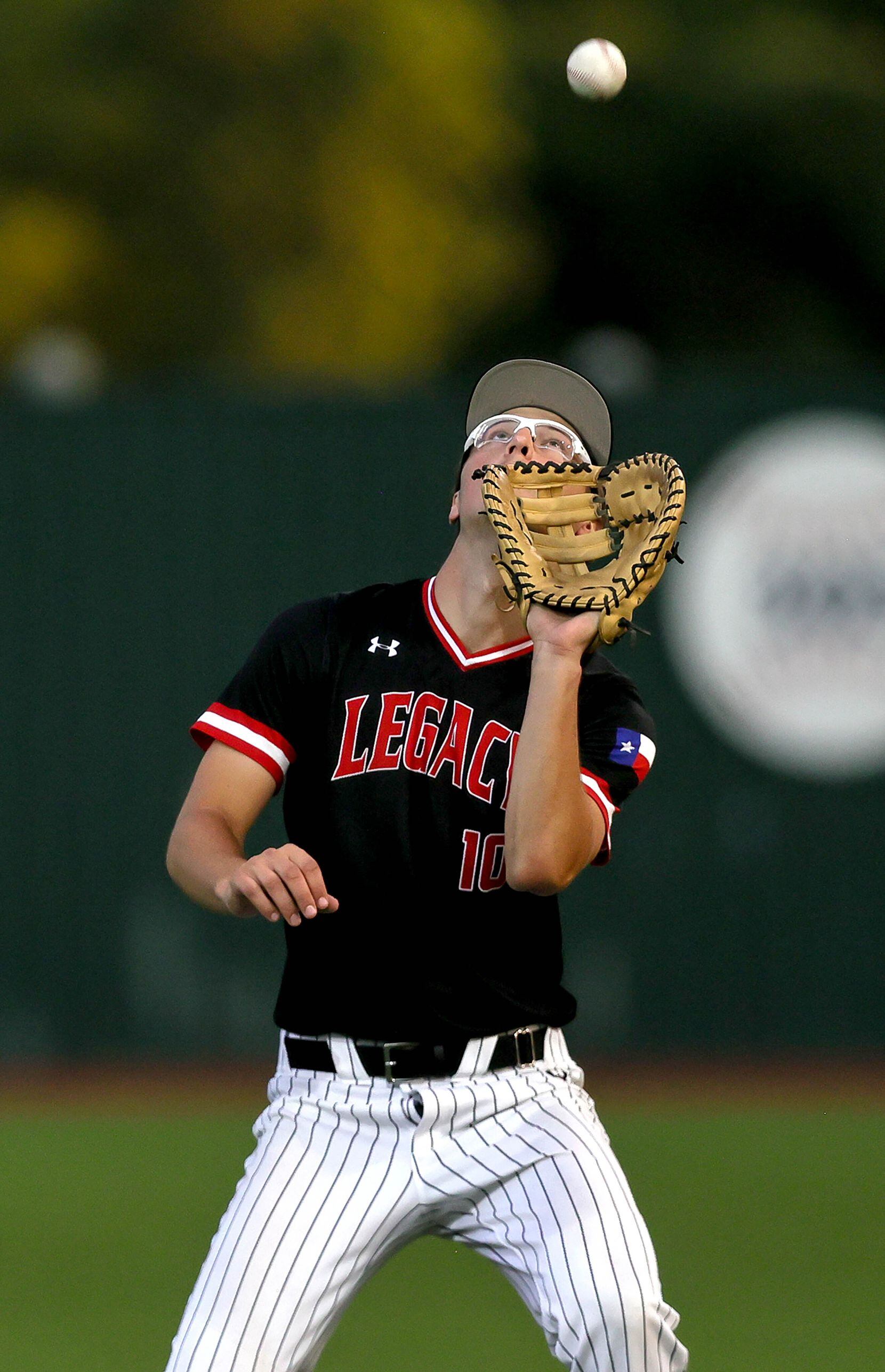 Mansfield Legacy first baseman Blake Julius makes a catch on a popout against Justin...