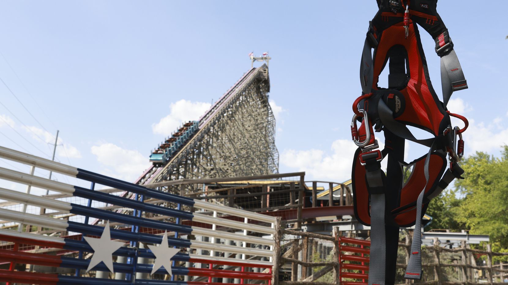 A harness used to strap in patrons will make the park’s rides more accessible at Six Flags...