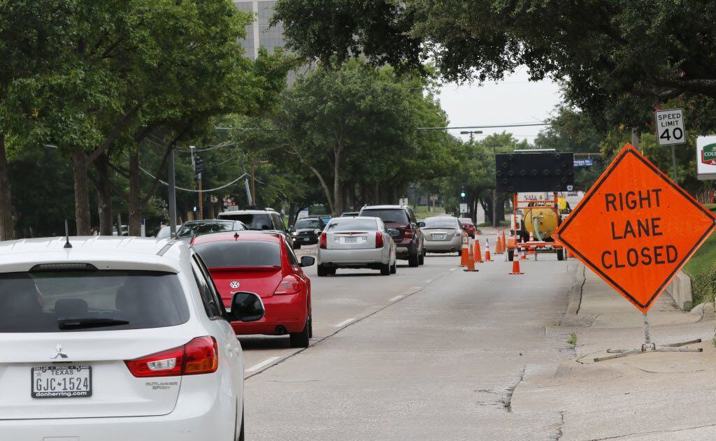 Vehicles travel on Midway Road in Addison. Midway is one of four major thoroughfares that...