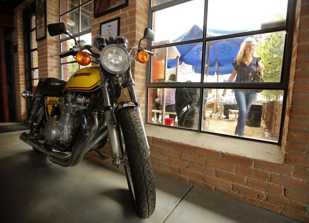 A 1979 Kawasaki 900 motorcycle  parked inside Off-Site Kitchen belongs to owner Nick...