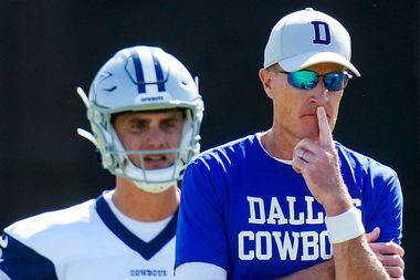 Dallas Cowboys special teams coordinator John Fassel and kicker Brandon Aubrey (1) look on...