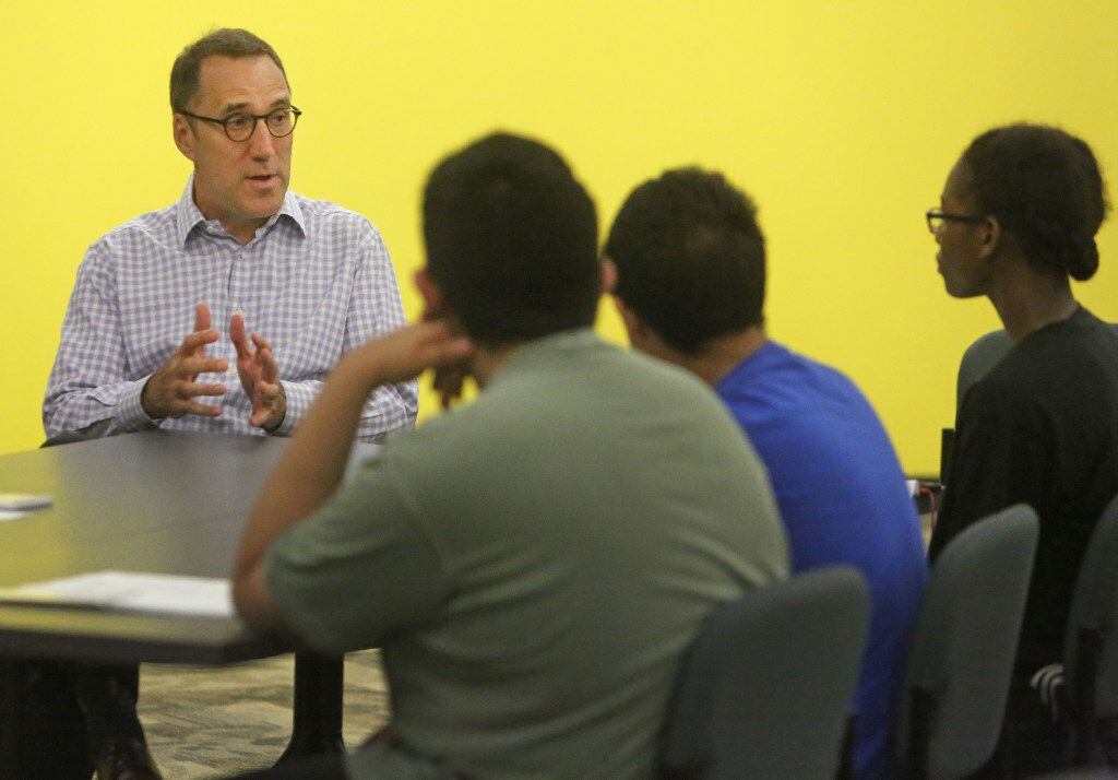Dallas Morning News Editor Mike Wilson talks with Dallas high school students who have an...