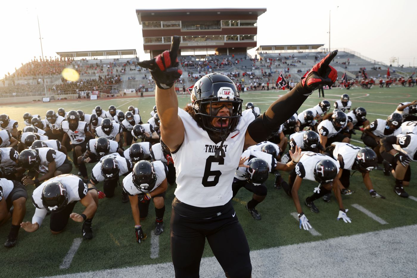 Euless Trinity linebacker Nai Mose (6) leads the team in the Sipi Tau prior to playing Colleyville Heritage during a high school football game in Grapevine, Texas on Friday, Sept. 10, 2021. (Michael Ainsworth/Special Contributor)