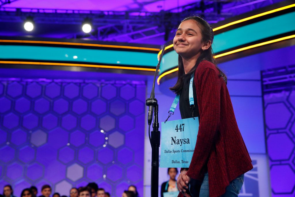 Naysa Modi, 12, of Frisco smiled after spelling her word correctly during the second Round...