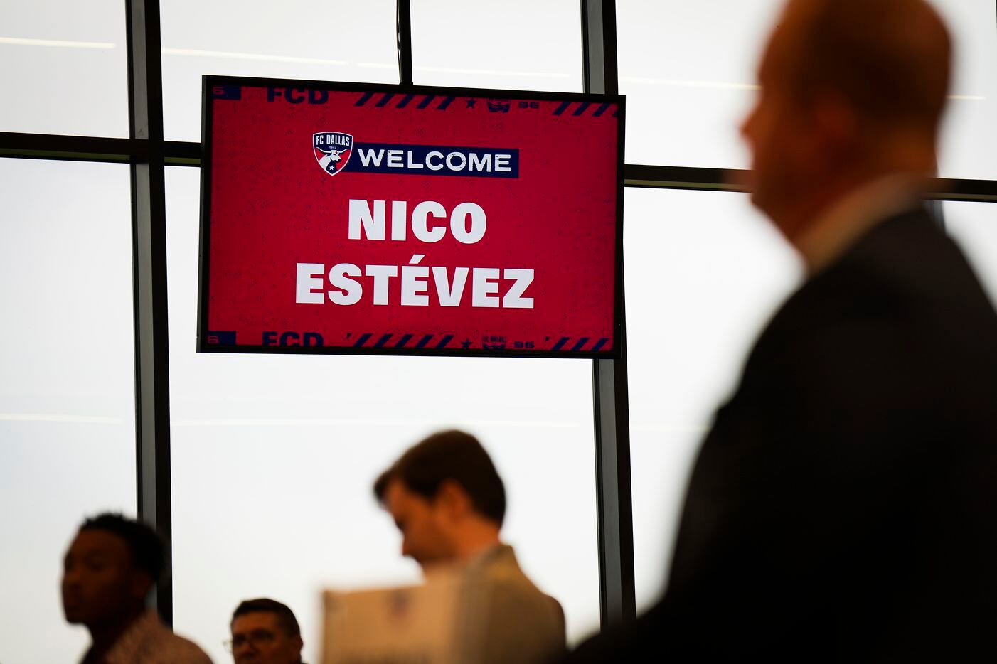 Frisco mayor Jeff Cheney (right) listens as new FC Dallas head coach Nico Estévez addresses his introductory press conference at the National Soccer Hall of Fame on Friday, Dec. 3, 2021, in Frisco, Texas.