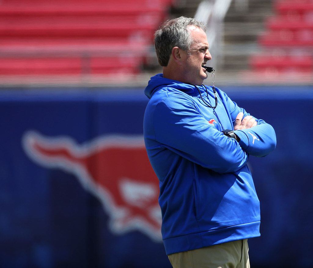 Southern Methodist Mustangs head coach Sonny Dykes watches a play during Southern Methodist...