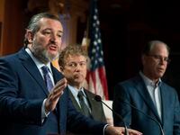 Sen. Ted Cruz, R-Texas, from left, with Sens. Rand Paul, R-Ky., and Mike Braun, R-Ind.,...