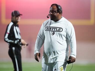 South Oak Cliff head coach Jason Todd works on the sidelines during the first half of a...
